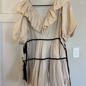 Elegant Cream Dress with Black Accents